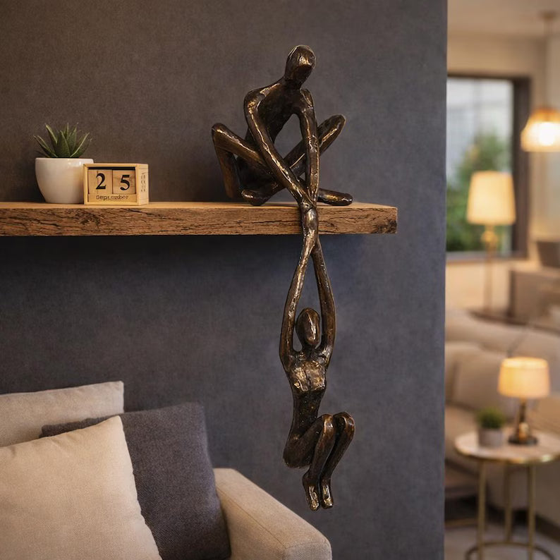 Man Lifting Woman Figurine