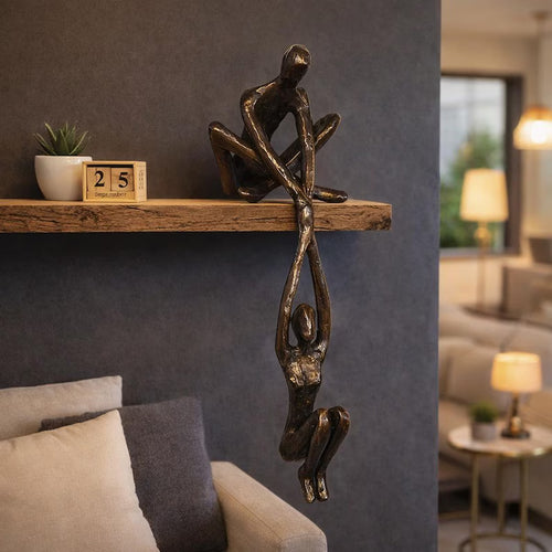 Man Lifting Woman Figurine